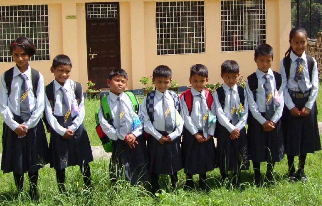 PLACE TO CALL HOME: Children outside the new orphanage in Nepal. PLACE TO CALL HOME: Children outside the new orphanage in Nepal.